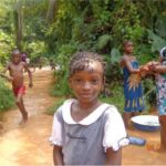 Fetching water at the Ekpe EbileOgu River,  children also have fun there